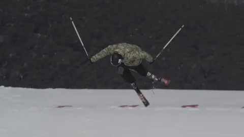 Skiier performs multiple aerial spins. Stock Footage 81882455