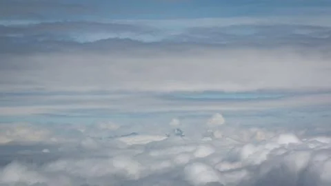 Skiing above the clouds Stock Photos