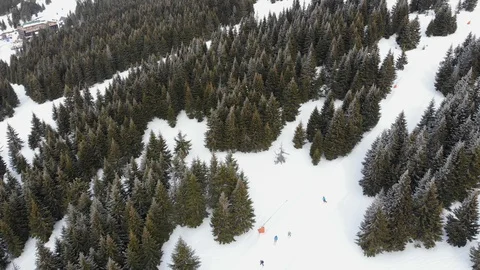 Skiing and snowboarding in mountain ski resort Stock Footage 106200214