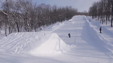 Skiing and snowboarding in the winter Stock Footage 72928824