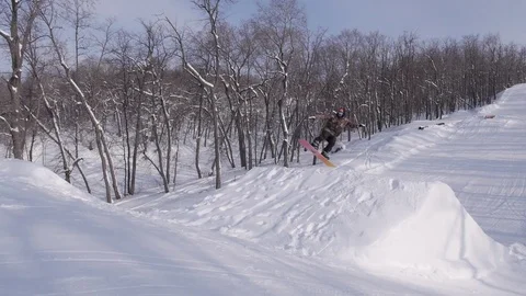 Skiing and snowboarding in the winter Stock Footage 72928835