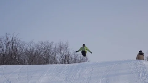 Skiing and snowboarding in the winter Stock Footage 72928839