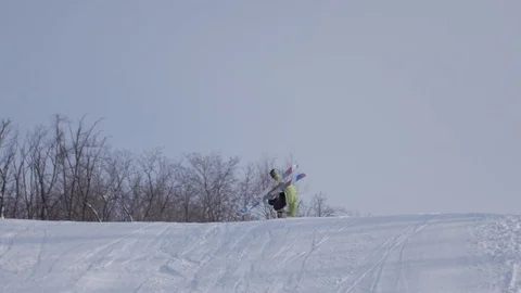 Skiing and snowboarding in the winter Stock Footage 72928841