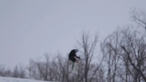 Skiing and snowboarding in the winter Stock Footage 72928842