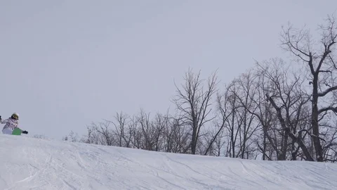 Skiing and snowboarding in the winter Stock Footage 72928848