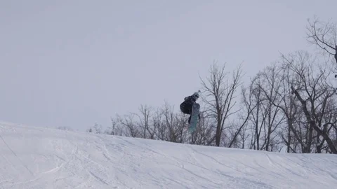 Skiing and snowboarding in the winter Stock Footage 72928850
