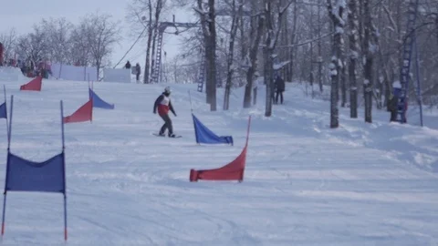 Skiing and snowboarding in the winter Stock Footage 72928859