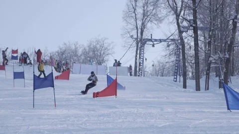 Skiing and snowboarding in the winter Stock Footage 72928867