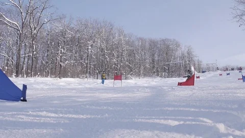 Skiing and snowboarding in the winter Stock Footage 72928878