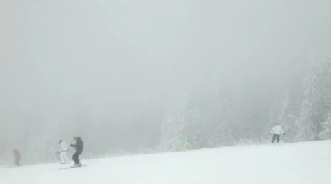Skiing in blizzard Stock Footage 10701283