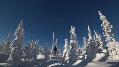 Skiing in a bright suit Stock Footage 139936827