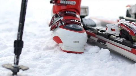 Skiing. A close-up of a ski boot and equipment. Fixing the boot in the skiing. Stock Footage 94889086