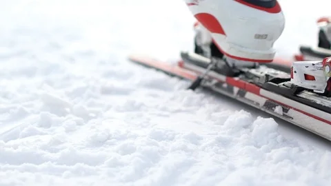 Skiing. A close-up of a ski boot and equipment. Fixing the boot in the skiing. Stock Footage 94889187
