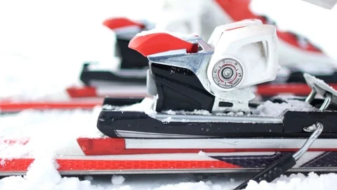 Skiing. A close-up of a ski boot and equipment. Fixing the boot in the skiing. Stock Footage 94889294