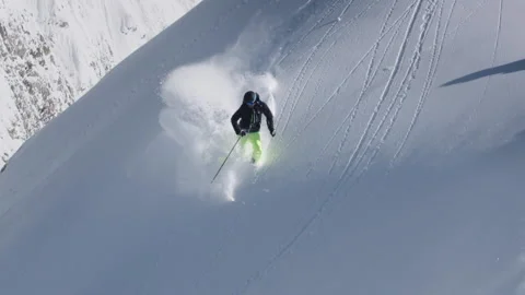 Skiing Down The Mountain In Deep Snow Stock Footage 144834439