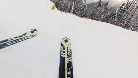Skiing down a slope. a first-person view Stock Footage 122776480