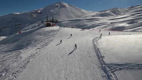 Skiing down slope Stock Footage 77044641