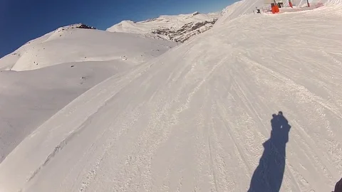 Skiing down slope Stock Footage 77047002