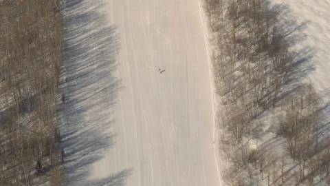 Skiing down snowy mountain Stock Footage