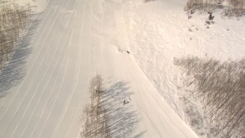 Skiing down snowy mountain Stock Footage 75214308