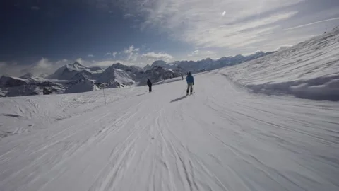 Skiing down at St-Luc 19 from Bella Tola Stock Footage 236759367