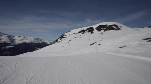 Skiing down at St-Luc 2 Stock Footage 236759307