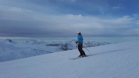 Skiing downhill first person point of view in the snowy mountain landscape Stock Footage 128135807