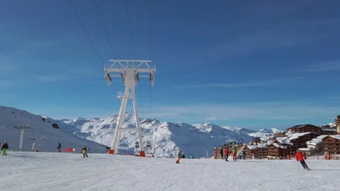 Skiing downhill first person point of view in the snowy mountain landscape Stock Footage 128136361