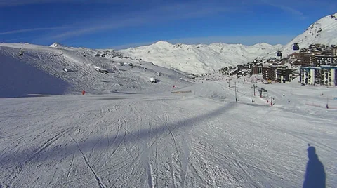 Skiing downhill towards Val Thorens Stock Footage 35872840