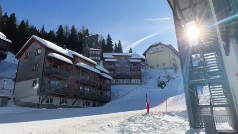 Skiing in front of apartment Stock Footage 232244884