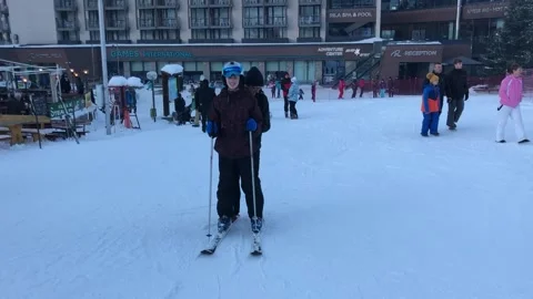 Skiing in mountains in Bulgaria Stock Footage 131380232