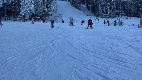 Skiing in mountains in Bulgaria Stock Footage 131380284