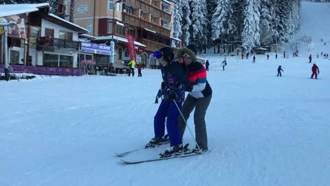 Skiing in mountains in Bulgaria Stock Footage 131380310