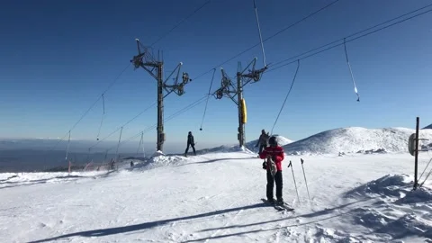 Skiing in mountains in Bulgaria Stock Footage 131380877