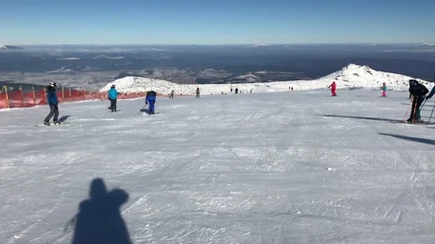 Skiing in mountains in Bulgaria Stock Footage 131381343