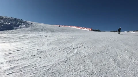 Skiing in mountains in Bulgaria Stock Footage 131381955
