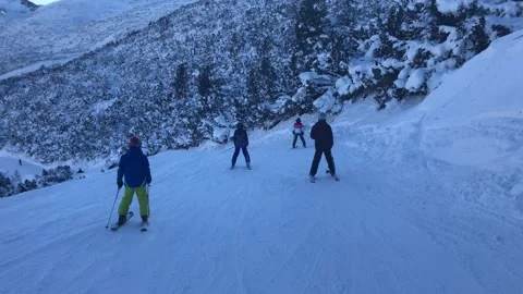 Skiing in mountains in Bulgaria Stock Footage 131383174