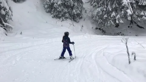 Skiing in mountains in Bulgaria Stock Footage 131383232