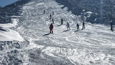 Skiing in mountains in Bulgaria Stock Footage 131383429