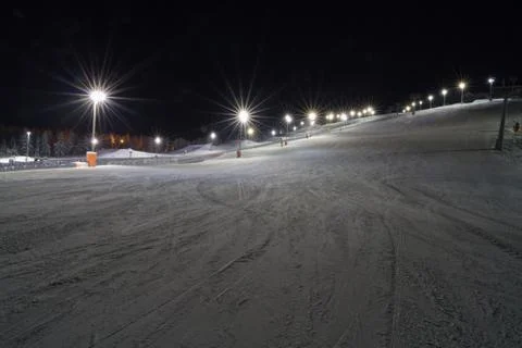 Skiing at night Stock Photos
