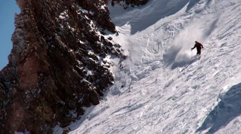 Skiing in powder - overcranked slowmotion Stock Footage 7753038