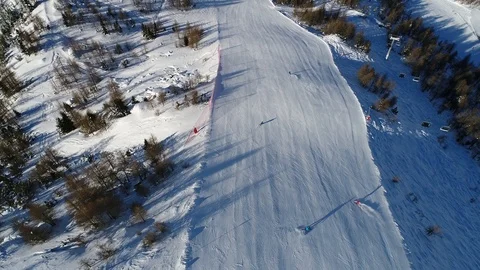 Skiing on the ski slopes, ski station in the Alps. Stock Footage 102597616