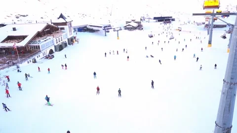 Skiing. Ski vacation. Rest in the mountains in the winter season. Skis, snowboar Stock Footage 242802586