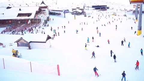 Skiing. Ski vacation. Rest in the mountains in the winter season. Skis, snowboar Stock Footage 242802606