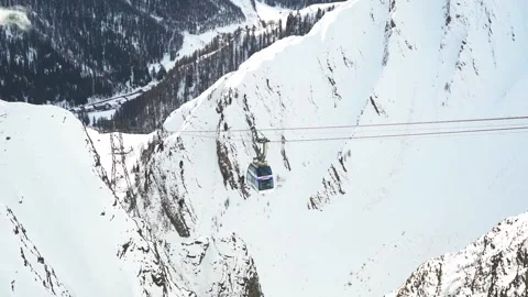 Skiing. Ski vacation. Rest in the mountains in the winter season. Skis, snowboar Stock Footage 242802654