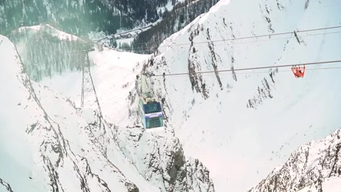 Skiing. Ski vacation. Rest in the mountains in the winter season. Skis, snowboar Stock Footage 242802841