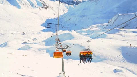 Skiing. Ski vacation. Rest in the mountains in the winter season. Skis, snowboar Stock Footage 242831056