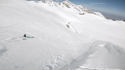 Skiing from the Skies- A Drone's Alpine Odyssey Stock Footage 253273905