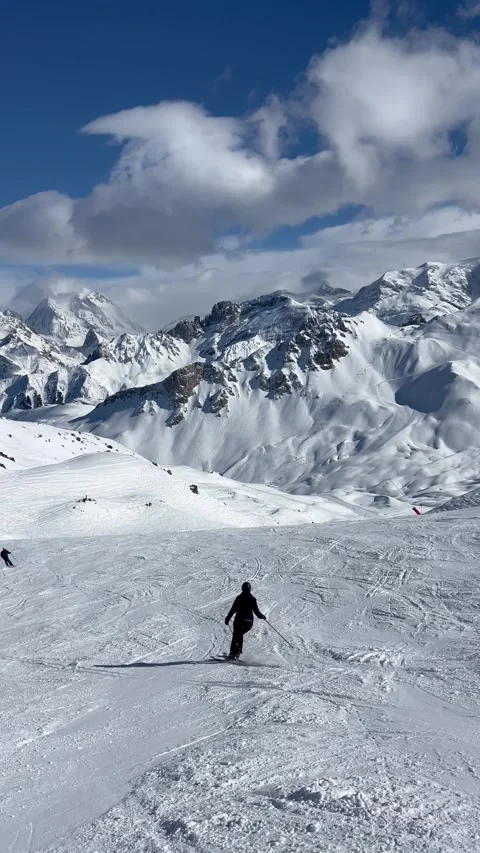 Skiing on the slopes of Courchevel Stock Footage 336928588