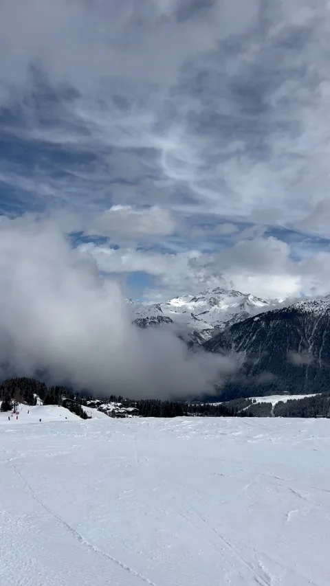 Skiing on the slopes of Courchevel ski resort Stock Footage 337098614